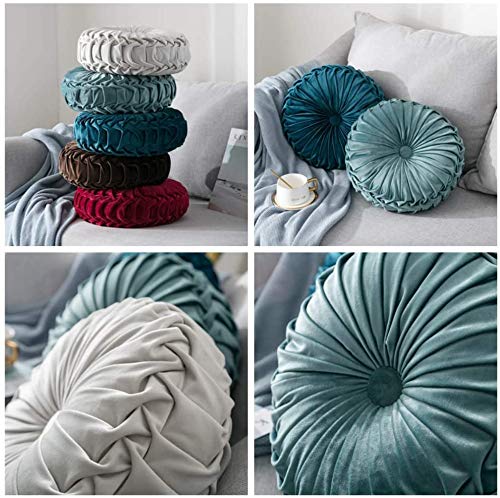 Teieas 14.96-inch round velvet pillow pairs with existing textiles for cohesive styling.