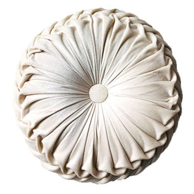 Teieas round velvet throw pillow with pleated beige design enhances sofa decor.