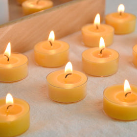 TELOSMA unscented beeswax tealight offers fragrance-free ambiance for sensitive spaces.