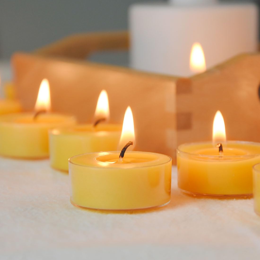 TELOSMA yellow beeswax tealight creates warm, natural glow in any setting.