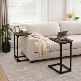 Sturdy steel frame on TEMI C-shaped end table provides stable support beside seating.