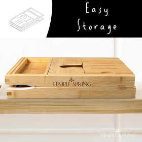 Temple Spring expandable tub tray arms grip wet edges without scratching for stability.