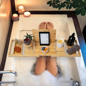 Temple Spring non-slip pads prevent tray shifting on tub surfaces.