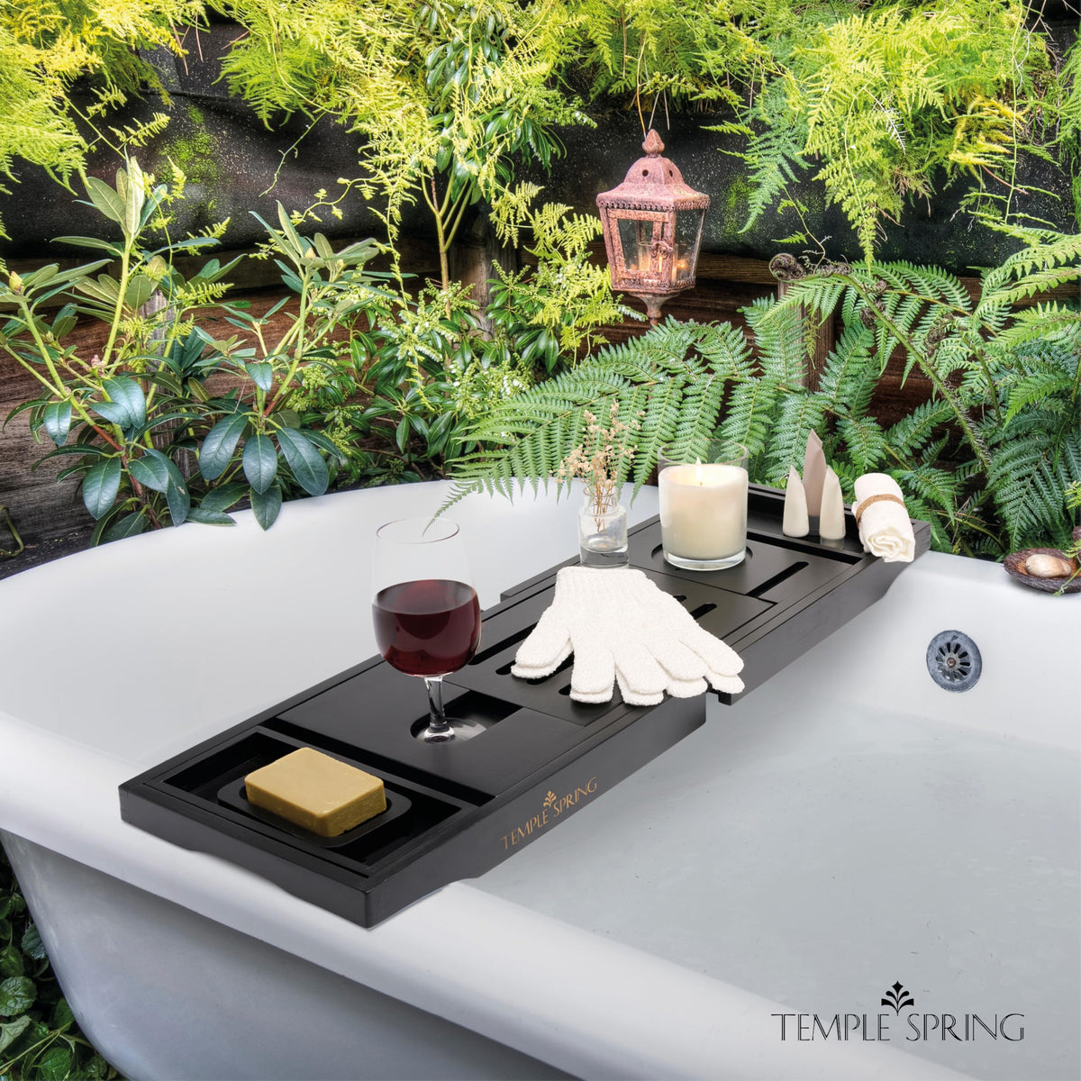 Temple Spring soft cloth and exfoliating gloves for a spa-like soak.