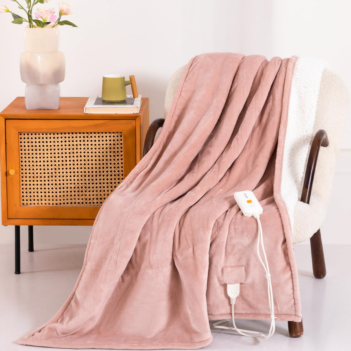 Templewet candy pink heated blanket folded for cozy storage