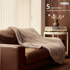 Templewet heated throw 50x60 on sofa delivering warmth during chilly evenings