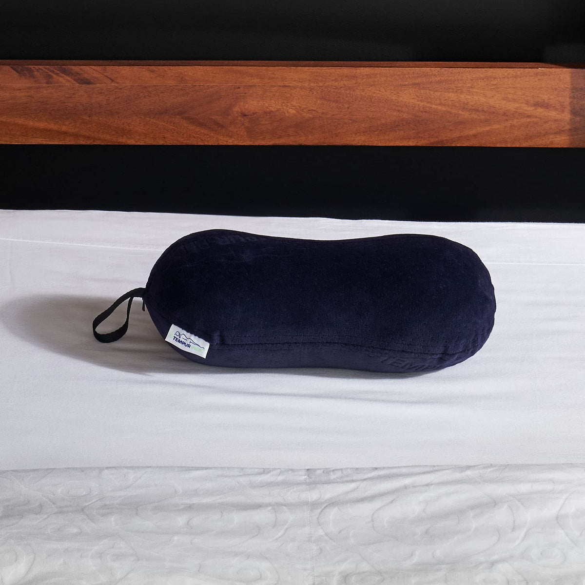 Tempur-Pedic peanut pillow used as neck roll to ease shoulder tension.
