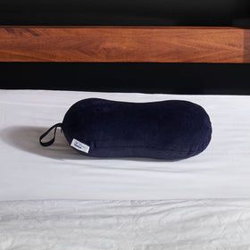 Tempur-Pedic peanut pillow used as neck roll to ease shoulder tension.