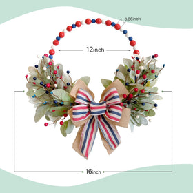 TEMPUS independence wreath red white blue berries and bow closeup.