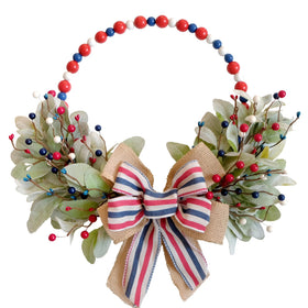 TEMPUS independence wreath wooden bead detail showing artisanal craft and texture.