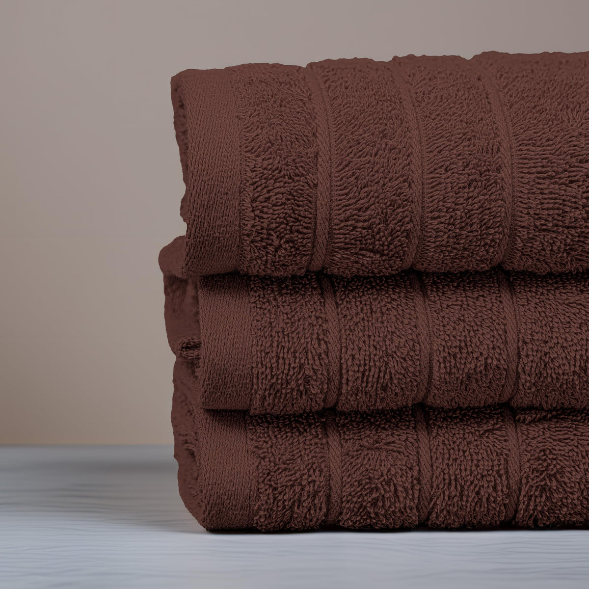 Tens Towels-16x28-brown-towels laid out for kitchen and bath routines.