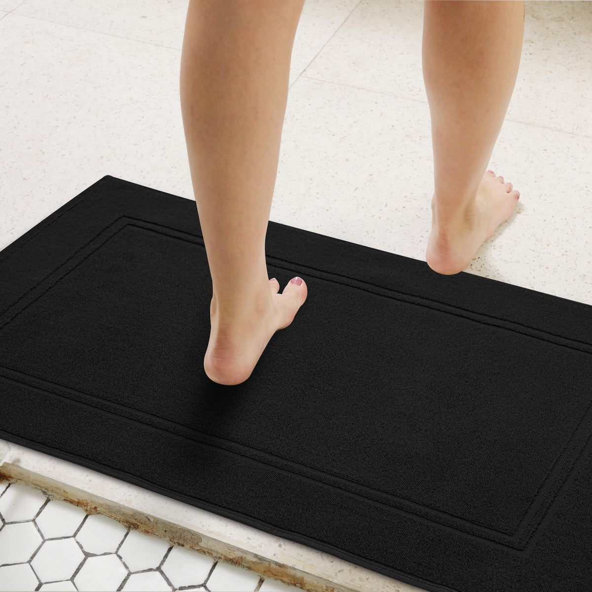 Tens Towels bath mat 20x32 inch size showcases generous coverage in bathrooms