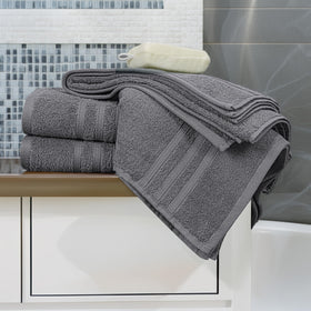 Tens Towels on bathroom rack in dark grey for daily use.