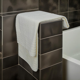 Tens Towels care instructions: wash separately and tumble dry low for longevity.