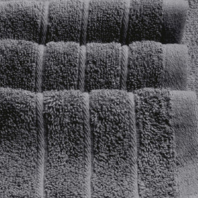 Tens Towels dark grey color adds modern bathroom style.