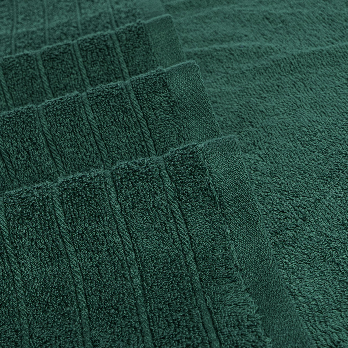 Tens Towels drying and care scene showing low-heat tumble drying.