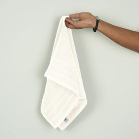 Tens Towels eco-certified green production label visible on packaging.