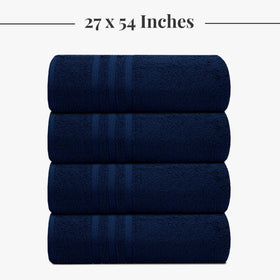 Tens Towels folded neatly navy towels on vanity.