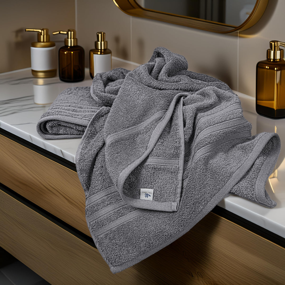 Tens Towels folded in laundry basket show compact storage.