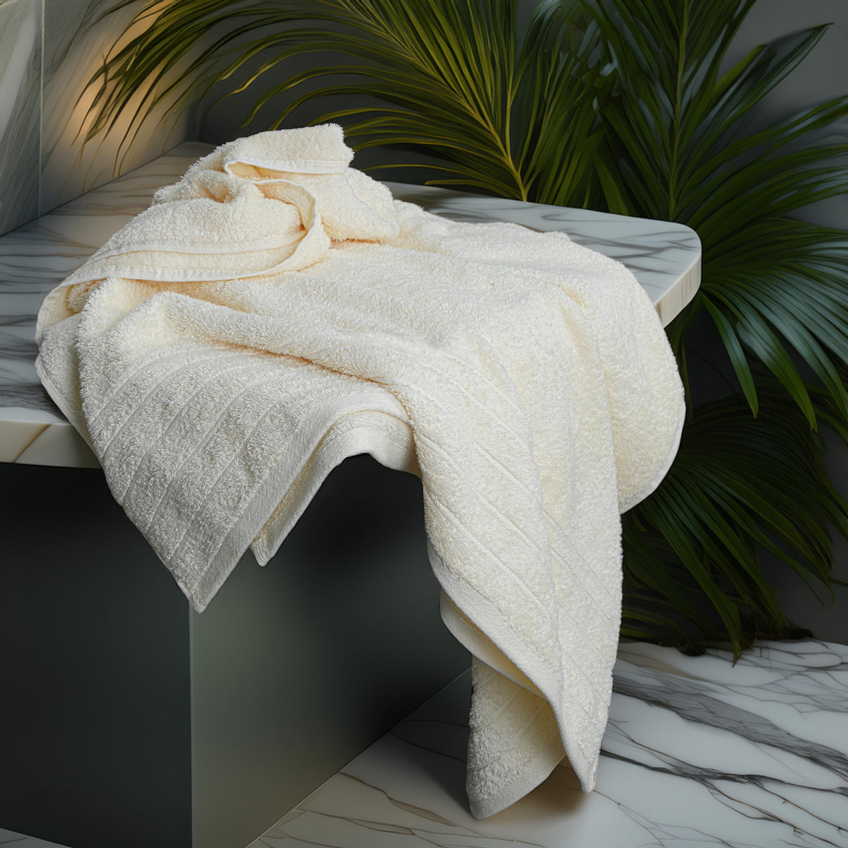 Tens Towels light-weight oversized bath sheet folded, easy to carry.