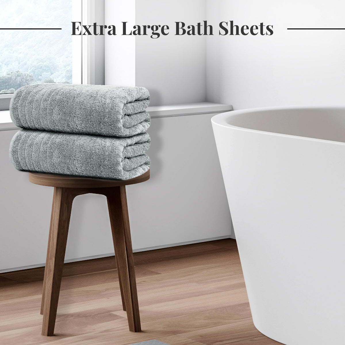 Tens Towels oversized bath sheets draped on chair show luxurious wrap potential.