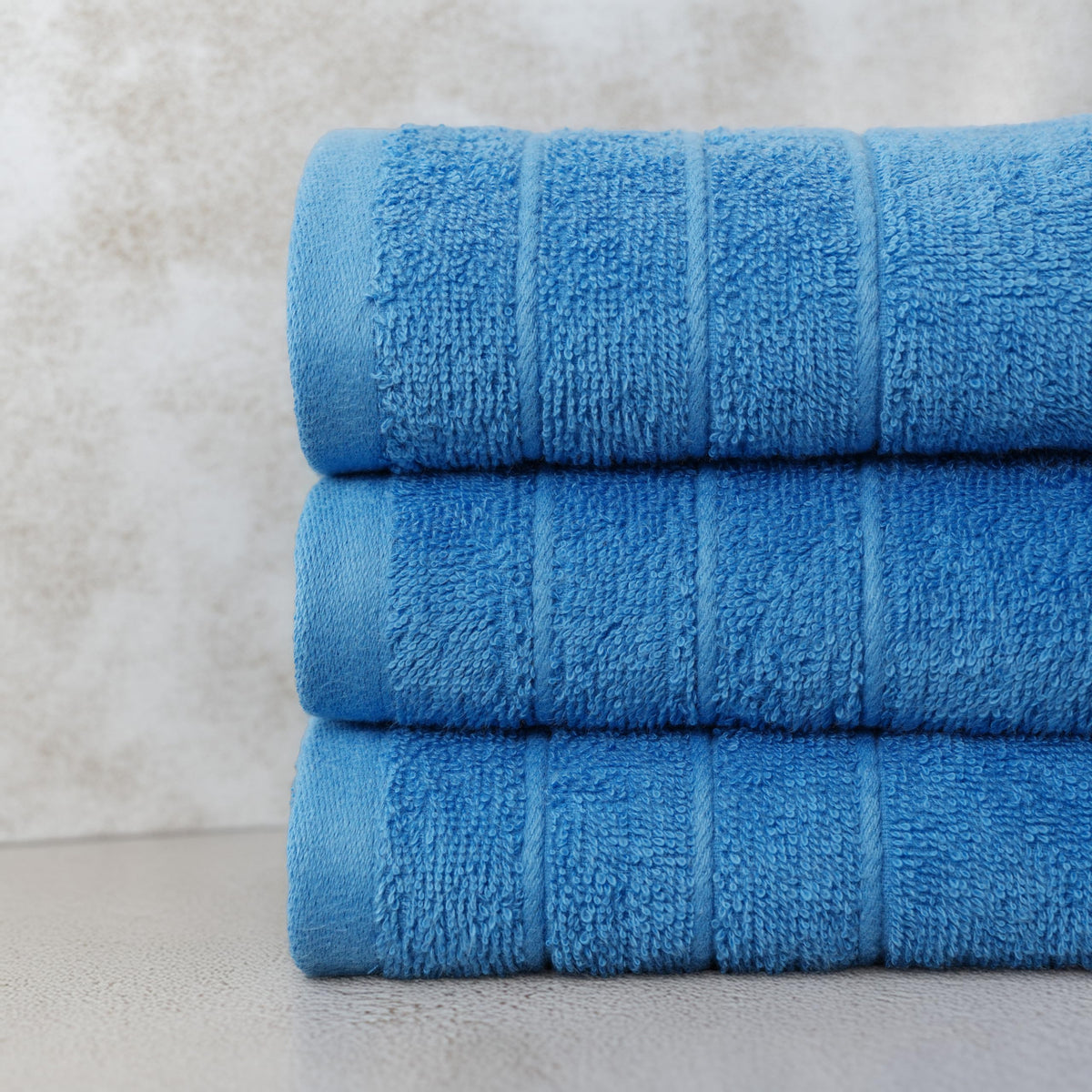 Tens Towels blue hand towels neatly folded for bathroom and kitchen daily use
