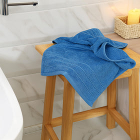 Tens Towels hand towels on a sink rack ideal for quick hand drying