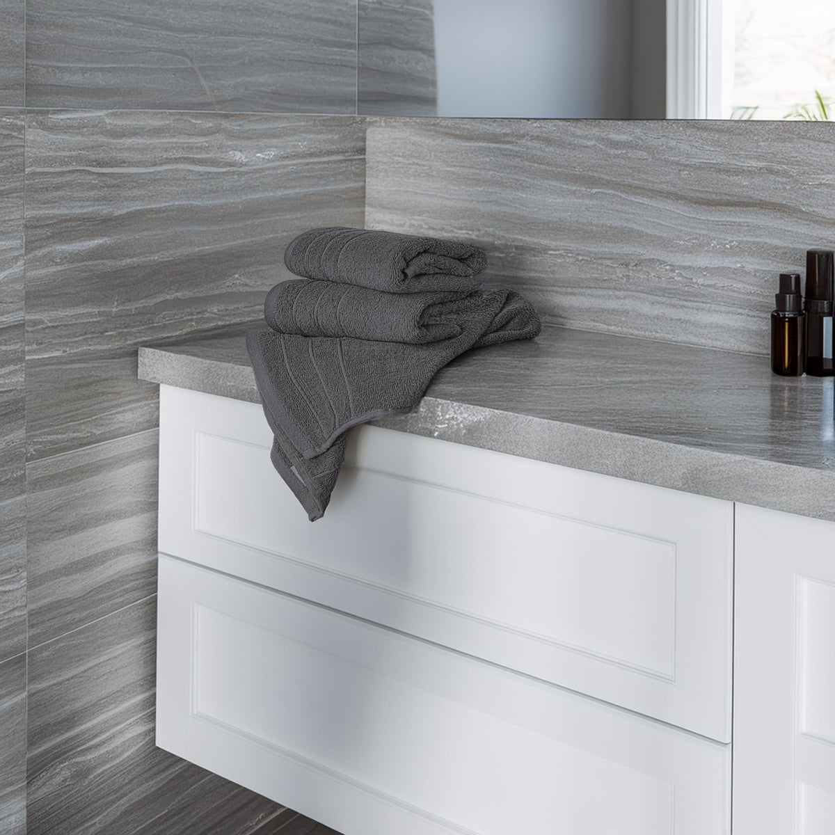 Tens Towels quick-dry folded towel demonstrates fast moisture absorption.