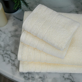Tens Towels cream hand towels featured for everyday hand drying and softness.