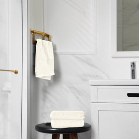 Tens Towels quick-dry fabric absorbency demonstrated after handwashing.