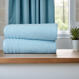 Tens Towels soft cotton texture close-up, premium feel.