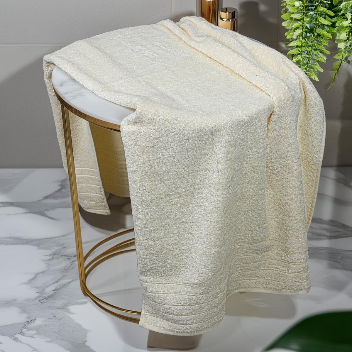 Tens Towels cream color towels with luxurious softness for spa-like at-home baths.