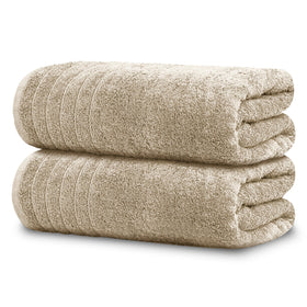 Tens Towels two oversized bath sheets laid flat, showcasing softness and size.