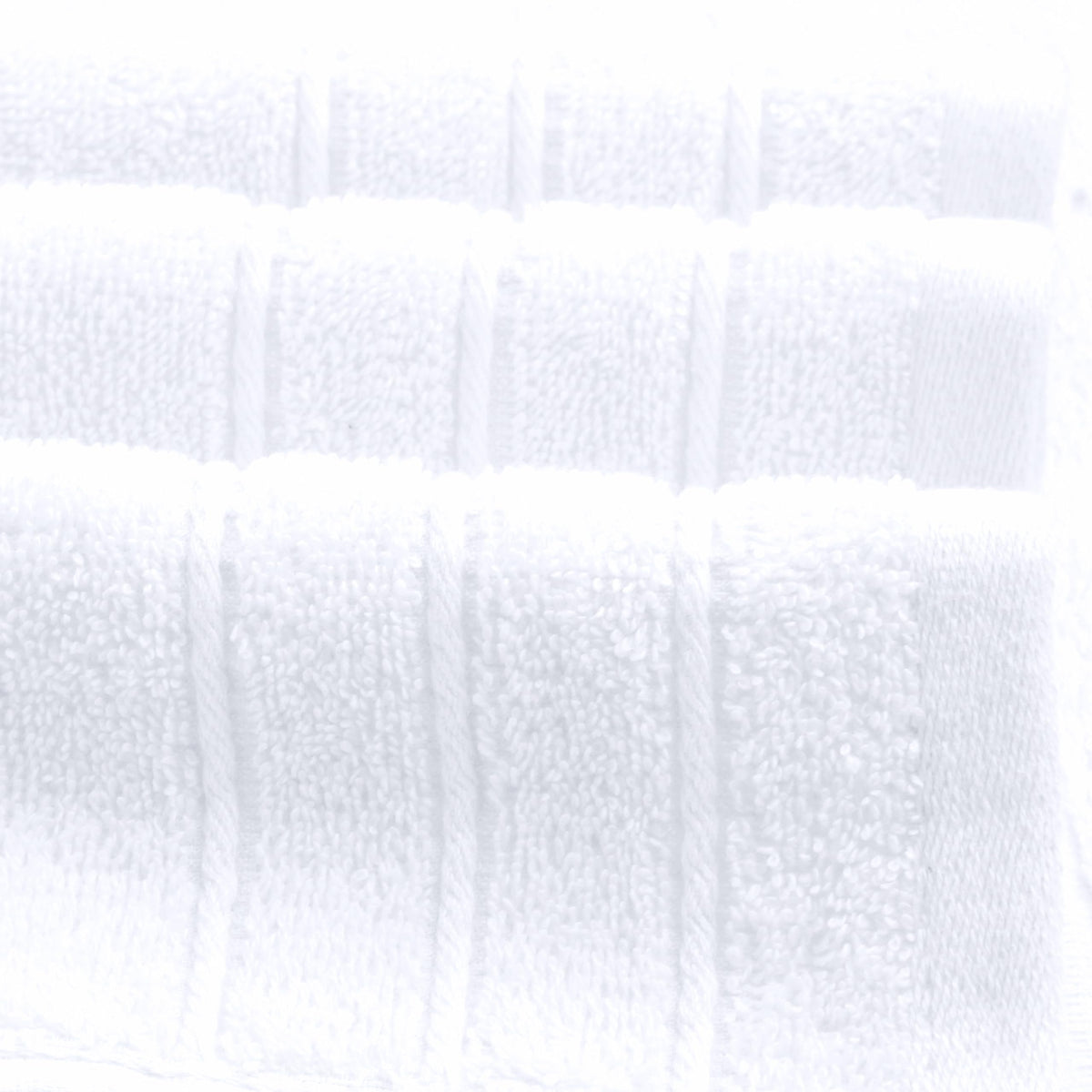 Tens Towels white oversized bath sheets provide absorbent comfort after shower.