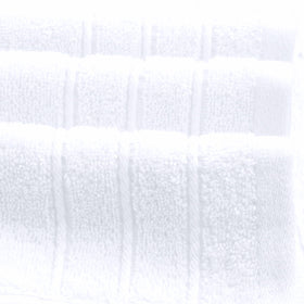 Tens Towels white oversized bath sheets provide absorbent comfort after shower.