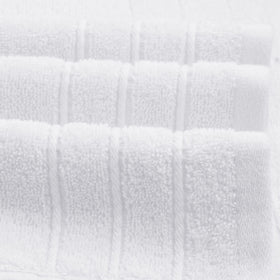 Tens Towels pristine white fabric, ideal for bathroom display.