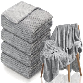 Tewloss 4-pack fleece throw blankets in gray displayed on sofa for broad coverage and warmth