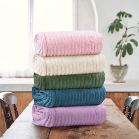 Texciting heated blanket ideal for beds, couches, or office use.