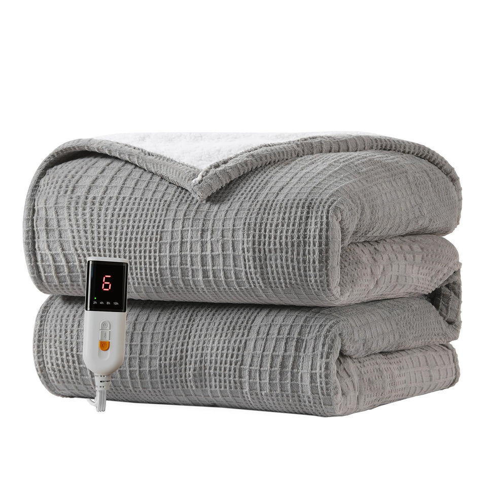 Texciting heated blanket throw on a bed with plush warmth