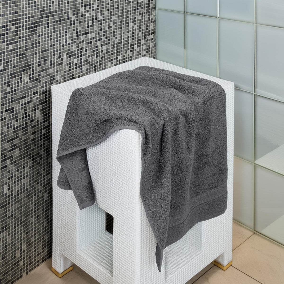 TEXCRAFT charcoal grey towels showing double-stitched hems for durability and longevity.