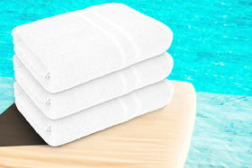 Textila Basic Medium Bath Towel 24x48 in hotel bathroom scene, clean white luxury.