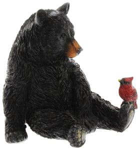 Resin finish emphasizes color-rich fur and cardinal plumage.