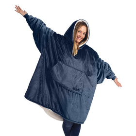 The Comfy Original hooded wearable blanket draped over a couch for cozy warmth