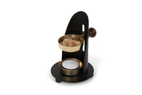 The Jerusalem Gift Shop incense burner in black and gold, elegant decor for calm spaces.