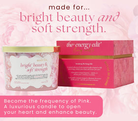 The Mindful Collective pink crystal candle label highlighting 55+ hour slow burn.