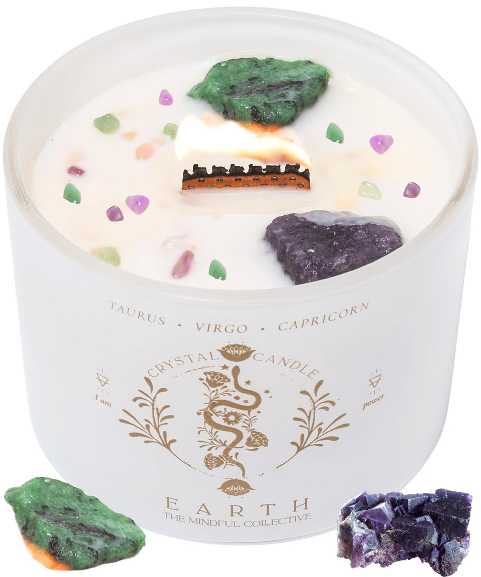 The Mindful Collective Taurus candle with pear-freesia scent and crystal infusion for calm rituals.