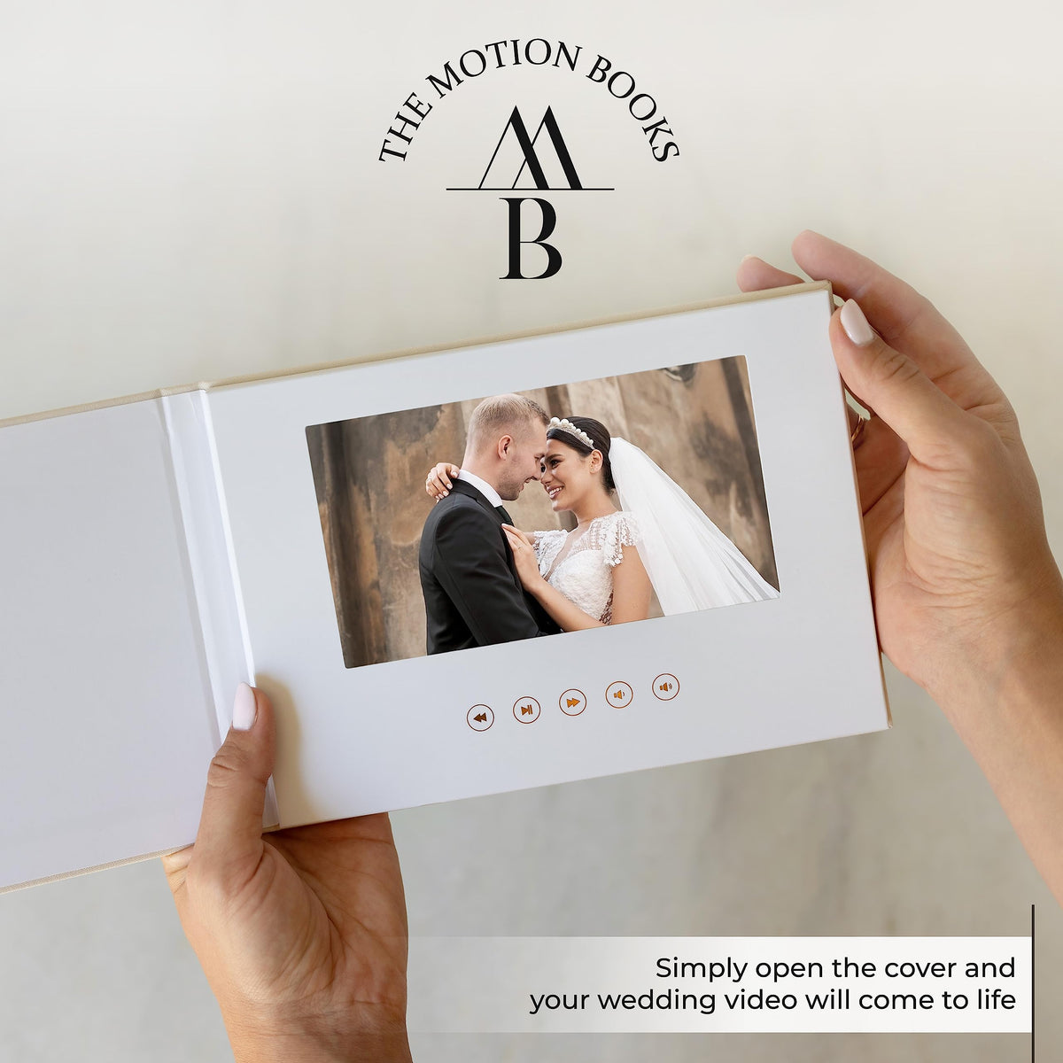 The Motion Books OUR WEDDING display opens to vibrant playback of your memories.