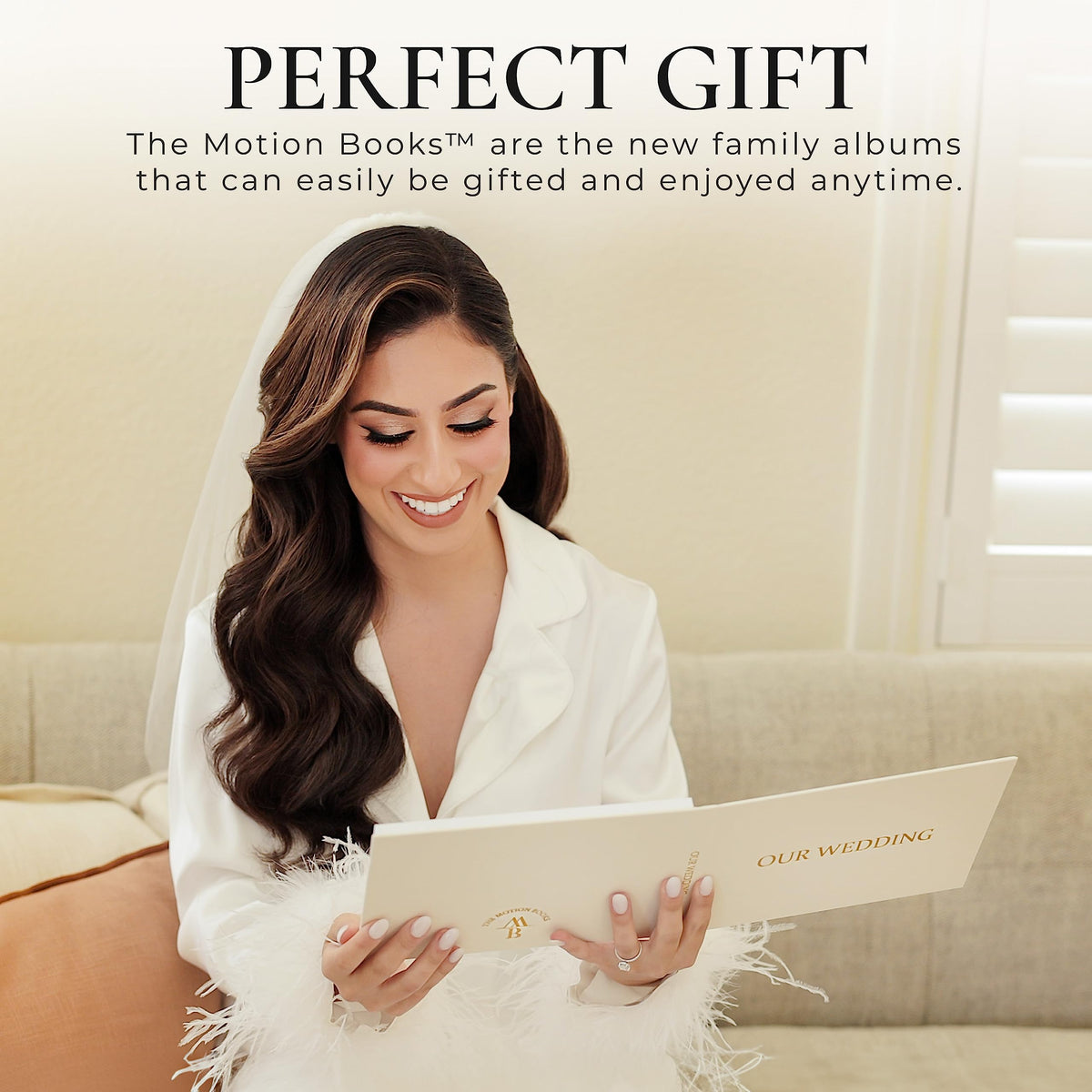 The Motion Books OUR WEDDING gold foil title adds timeless elegance to the keepsake.