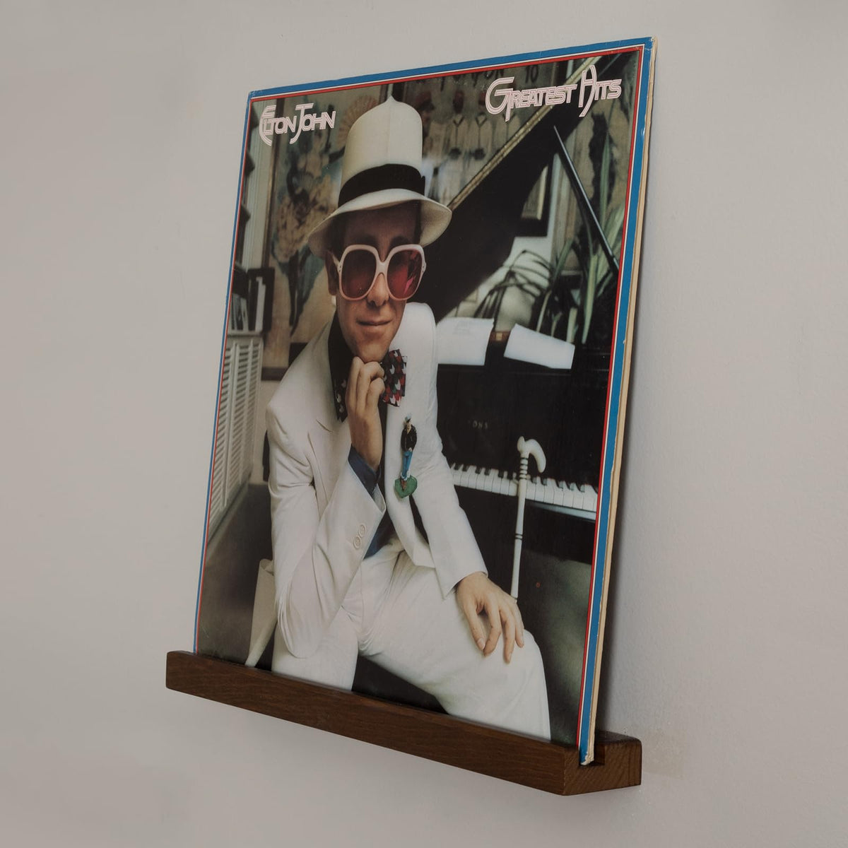 The Retro Apothecary vinyl wall display keeps your collection organized and accessible.