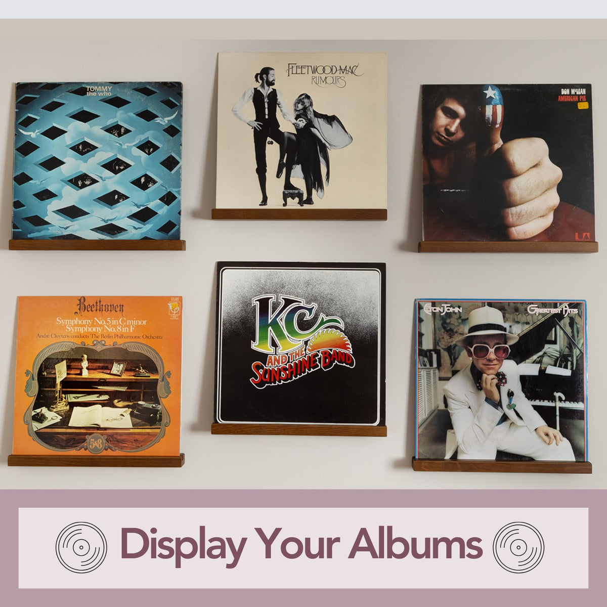 The Retro Apothecary vinyl record display shelf with walnut finish adds sophisticated decor.